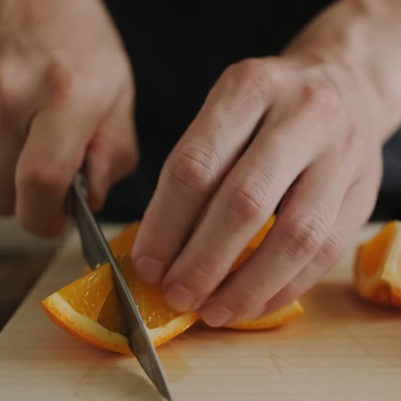 Step 1 Blend the orange mixture for Orange Lamington Cake