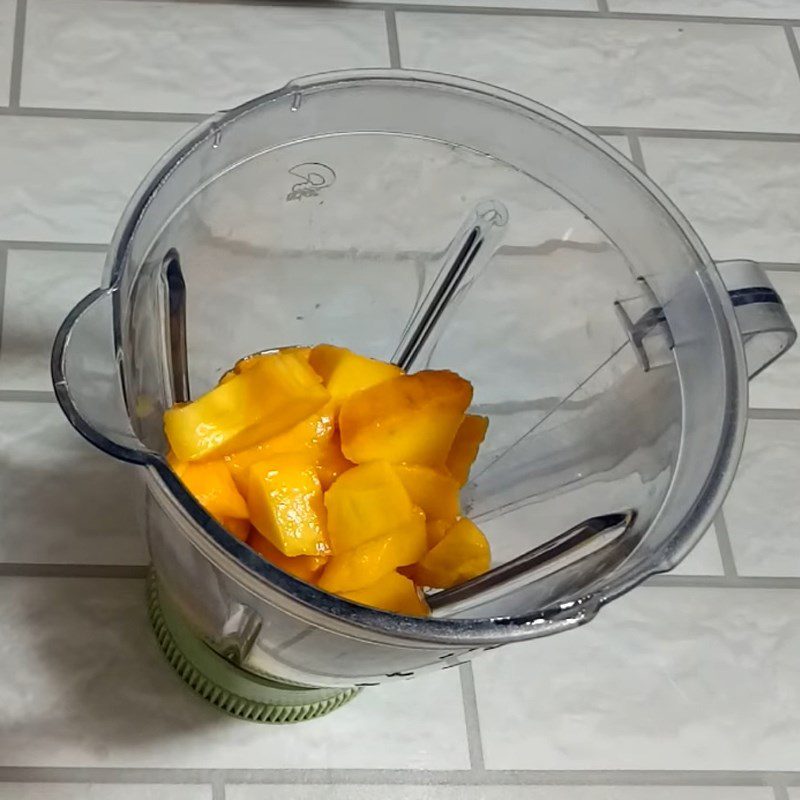 Step 2 Blending mango Chewy Mango Cake