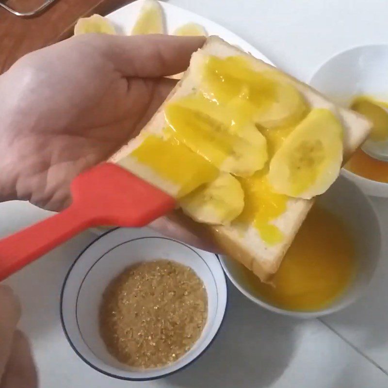 Step 2 Layer ingredients on the bread Grilled banana sandwich with butter