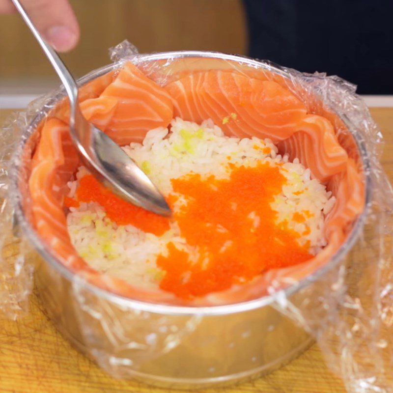 Step 3 Arrange ingredients in the mold for sushi birthday cake