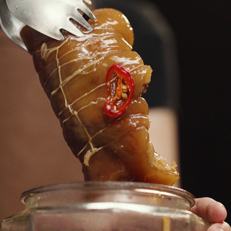 Step 5 Place in jar and soak pig's ears Pig's ears soaked in fish sauce