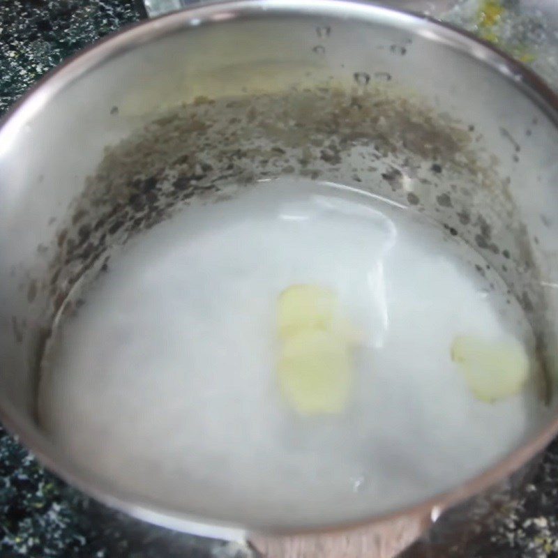 Step 1 Wash rice and cook Barramundi porridge for baby weaning with vegetables