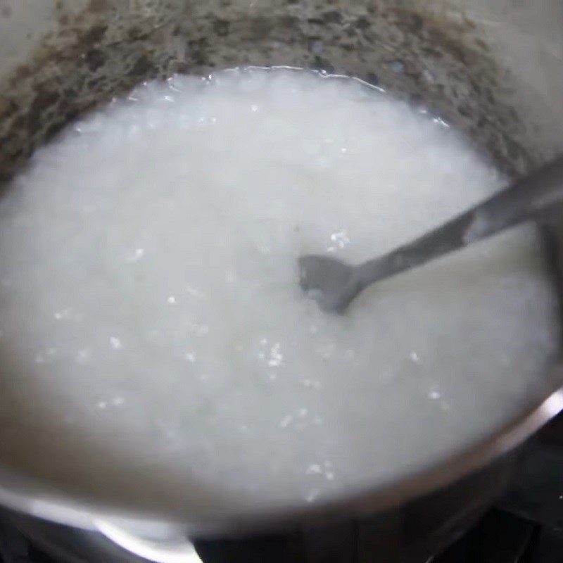 Step 1 Wash rice and cook Barramundi porridge for baby weaning with vegetables