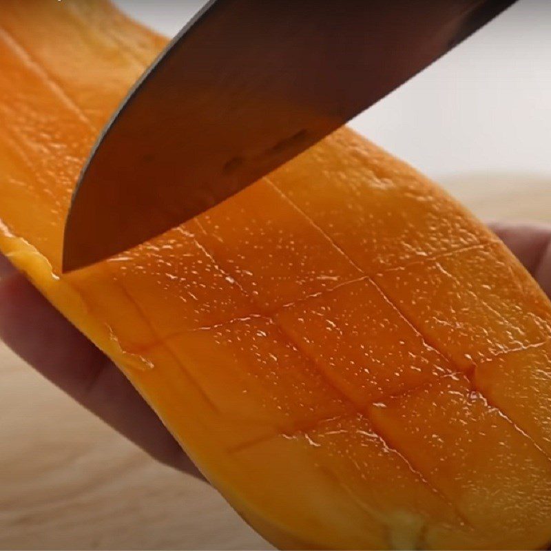 Step 1 Chop the mango Mango Chestnut Sponge Cake