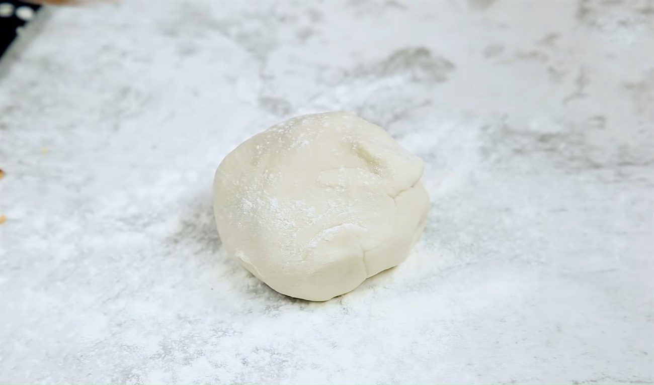 Step 2 Rolling the dough to make noodles Durian noodles