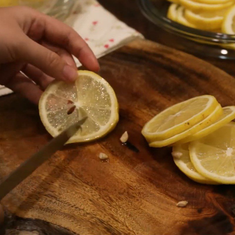 Step 2 Cut the lemon Lemon soaked in sugar