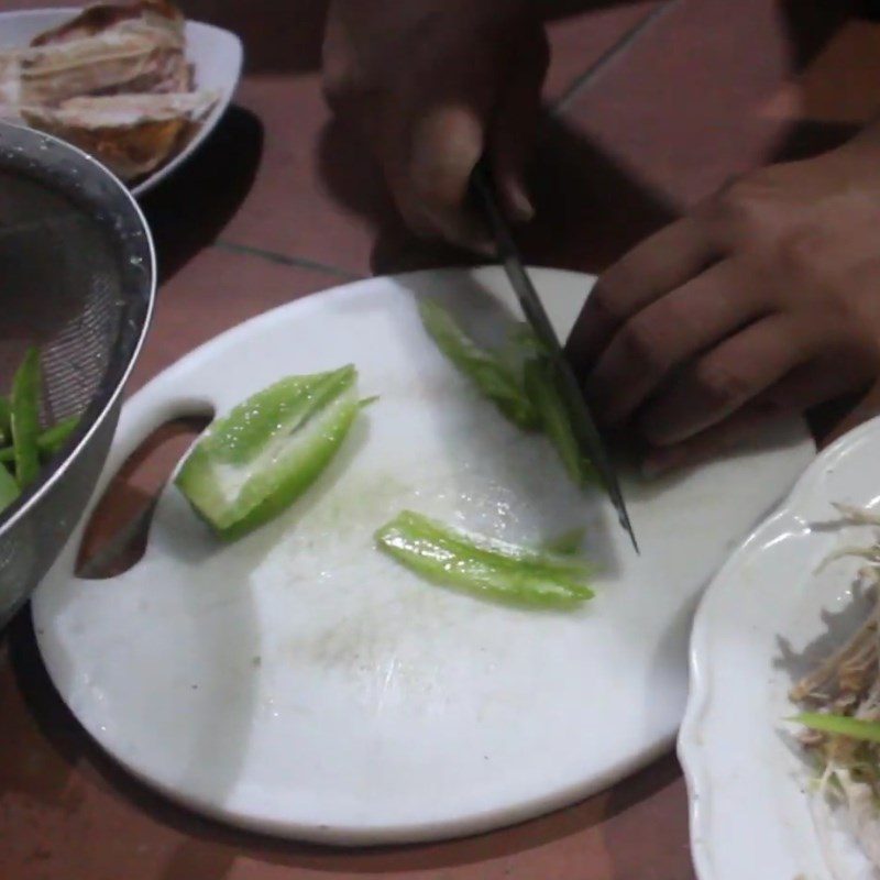 Step 4 Cut the starfruit Dried squid and banana blossom salad