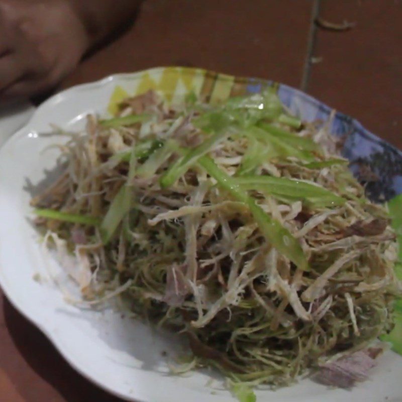 Step 4 Cut the starfruit Dried squid and banana blossom salad