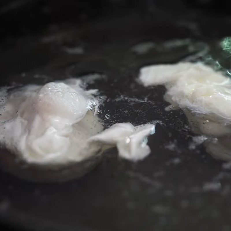 Step 7 Poached egg with ramen noodles mixed with pork belly