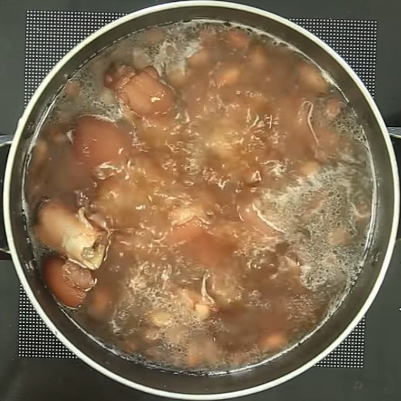 Step 2 Simmer the pork leg with peanuts Pork leg simmered with peanuts