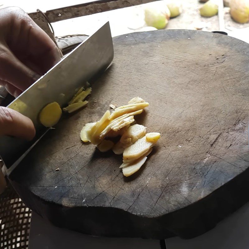 Step 6 Cooking the syrup for Gac sticky rice balls with durian filling