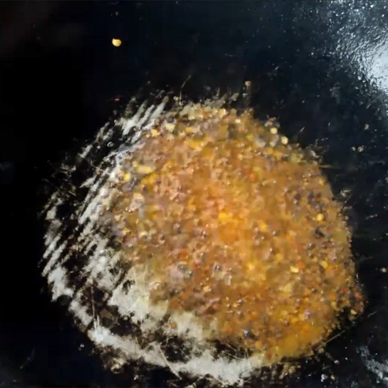 Step 3 Frying anchovies with garlic fish sauce and chili powder Dried anchovies fried with fish sauce