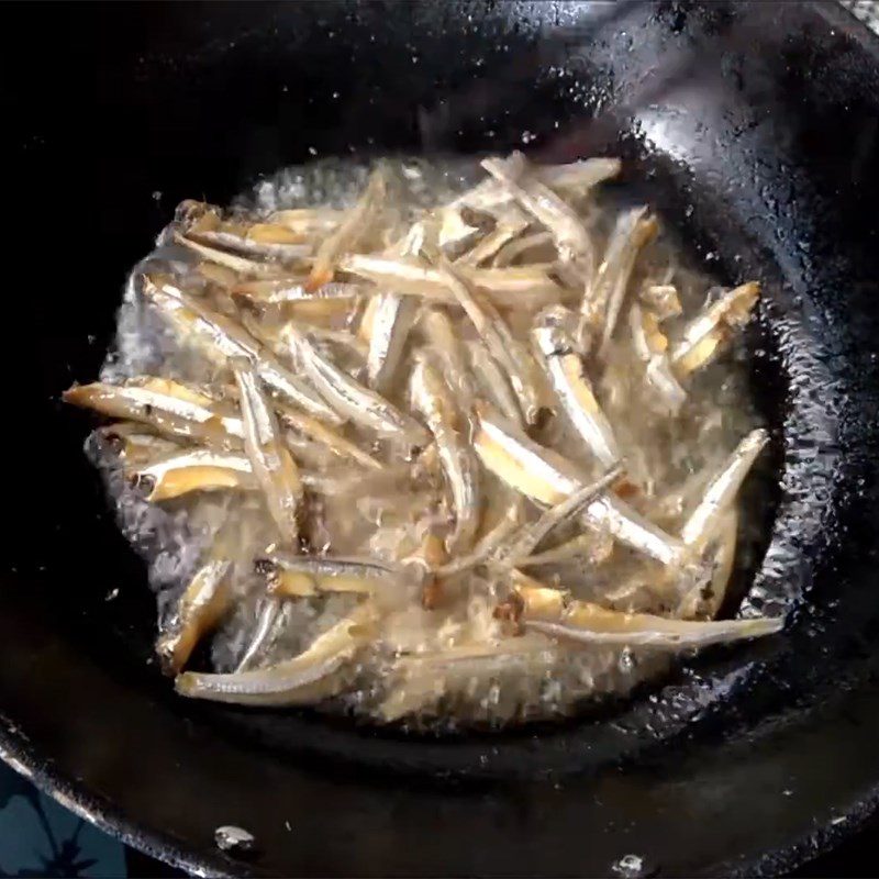 Step 3 Frying anchovies with garlic fish sauce and chili powder Dried anchovies fried with fish sauce