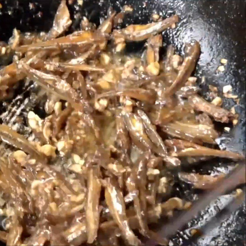 Step 3 Frying anchovies with garlic fish sauce and chili powder Dried anchovies fried with fish sauce