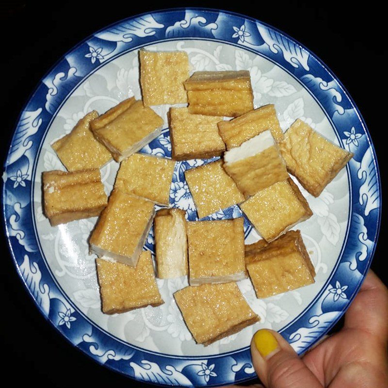 Step 2 Fry the tofu for Stir-fried Bitter Melon with Carrot