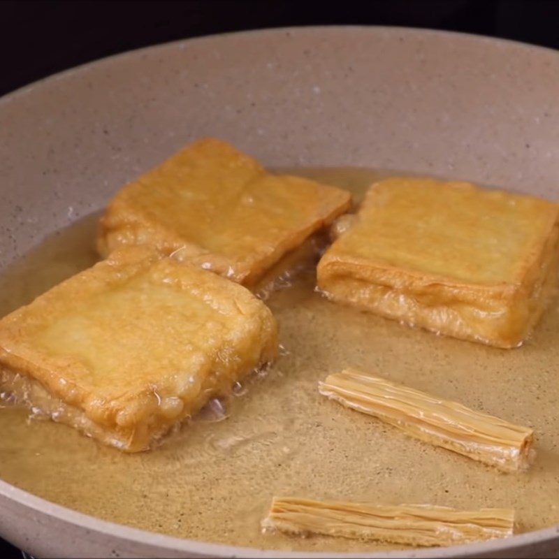 Step 2 Fry tofu for vegetarian beef pho