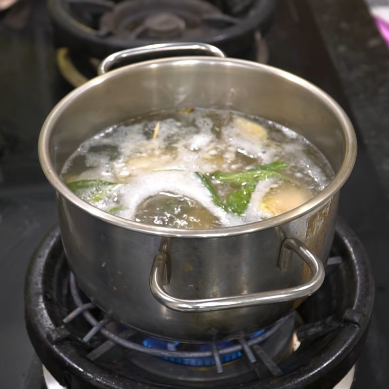 Step 3 Boil chicken Fried chicken with sesame and Vietnamese coriander