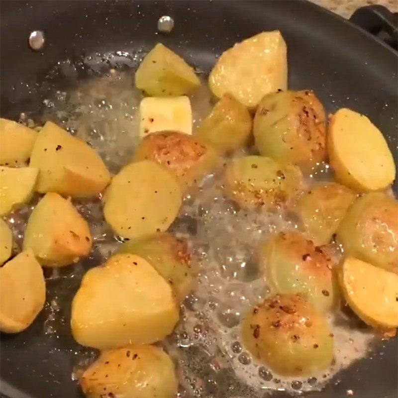 Step 3 Fry potatoes with minced garlic, butter, and rosemary Garlic Butter Fries