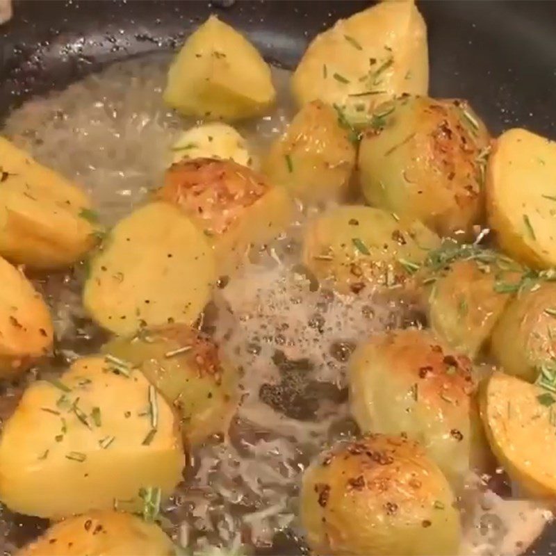 Step 3 Fry potatoes with minced garlic, butter, and rosemary Garlic Butter Fries