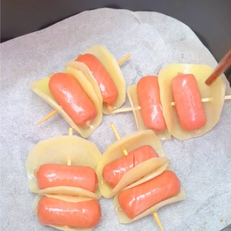 Step 3 Frying Potatoes Wrapped in Sausage Using an Air Fryer How to Make Fried Potatoes Wrapped in Sausage