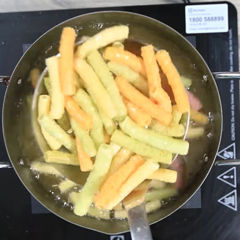 Step 1 Fry the macaroni Fried macaroni with cheese and pork floss