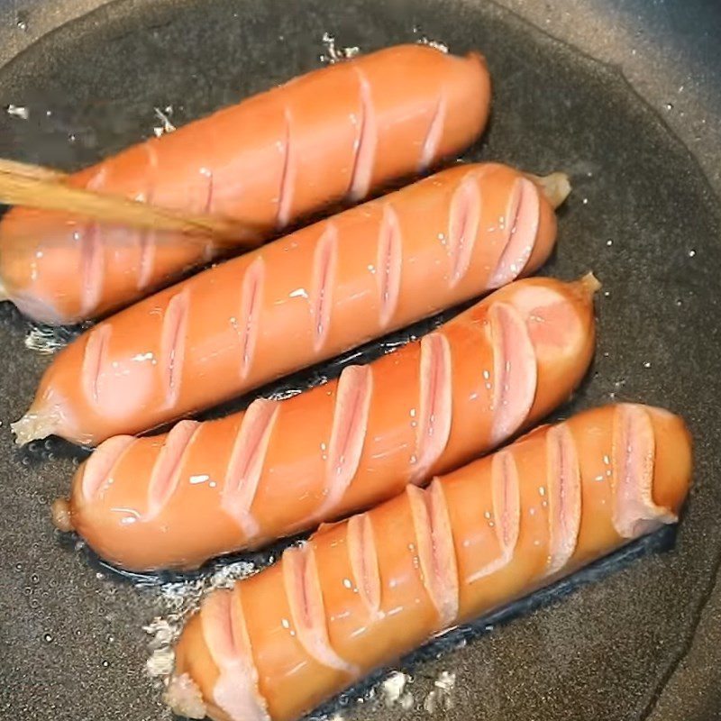 Step 2 Fry the sausage for salad, sausage, cucumber