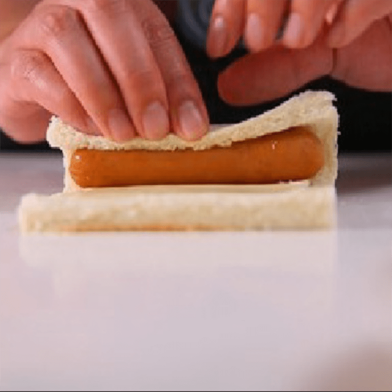 Step 2 Wrap the bread sausage cheese roll
