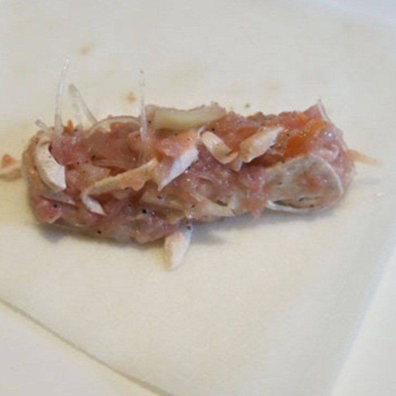 Step 3 Rolling the spring rolls Shrimp and pork spring rolls with taro