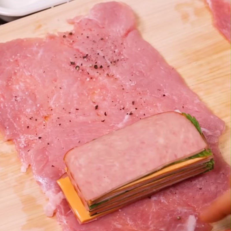 Step 4 Roll the meat Pork rolled with cheese and fried ham