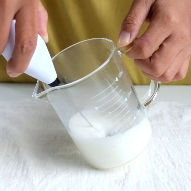 Step 2 Frothing milk Iced cocoa milk