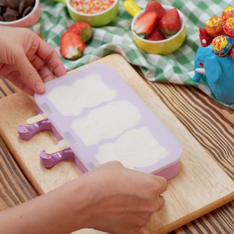 Step 4 Pour into molds and freeze Strawberry milk popsicle