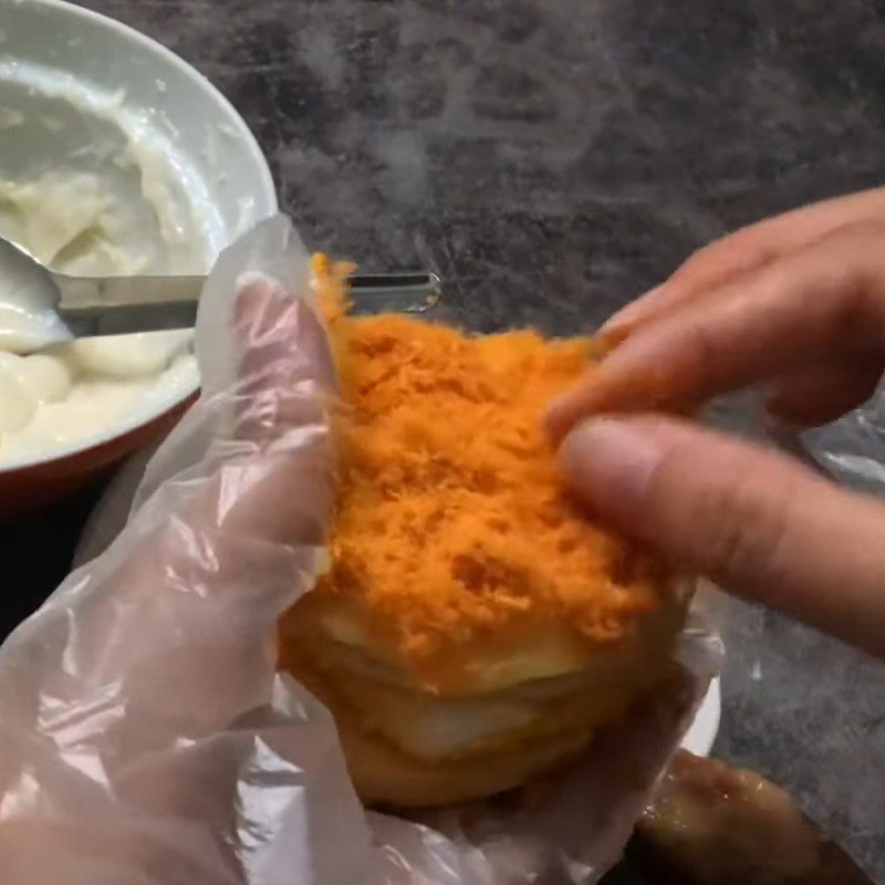 Step 7 Assemble the cake Mochi cake with salted egg and spicy chicken floss