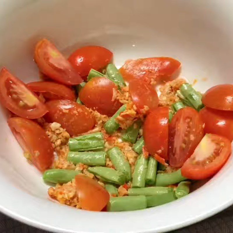 Step 3 Pound tomatoes and green beans with the garlic chili cashew mixture for Carrot Salad