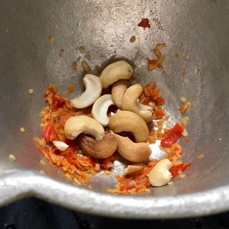 Step 2 Pound cashews with garlic and chili for Carrot Salad