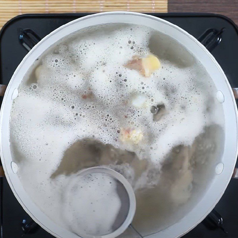 Step 1 Simmer chicken bones for soybean milk chicken hot pot