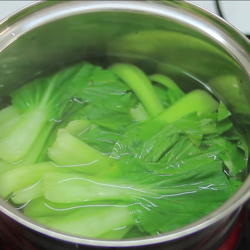 Step 2 Steaming chicken and blanching bok choy Steamed chicken with bok choy