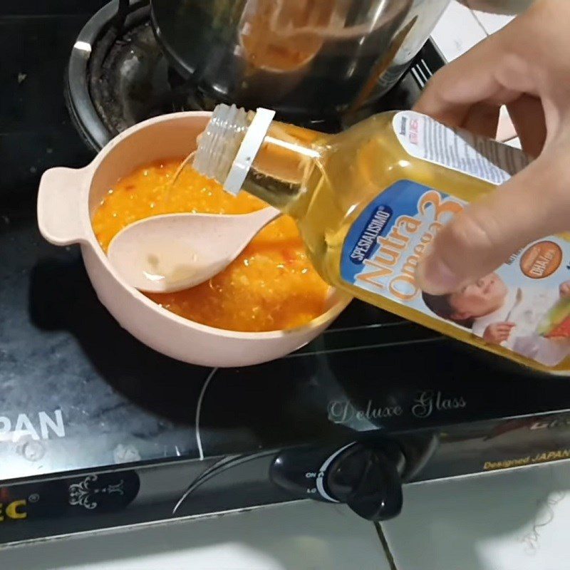 Step 3 Completion of Gấc Porridge for Baby