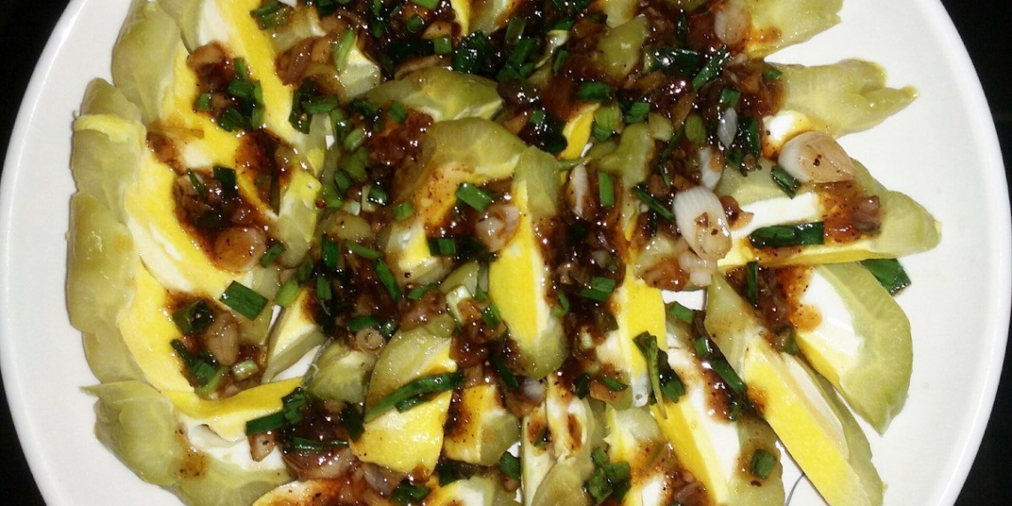 how to make bitter melon stuffed with egg and tomato sauce delicious recipe 10709