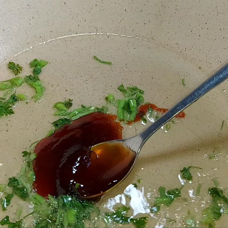 Step 3 Simmering vegetarian sausage for Tho Vegetarian Noodles