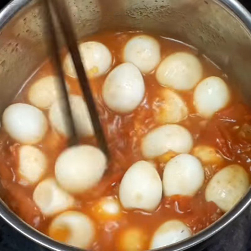 Step 3 Braise quail eggs and mushrooms Quail eggs braised with straw mushrooms and tomatoes