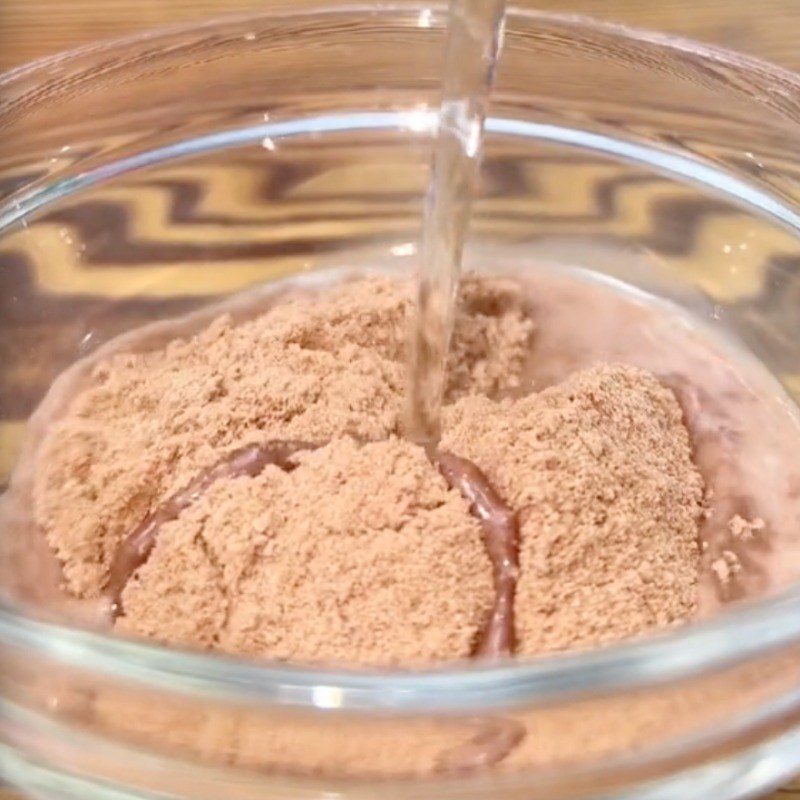 Step 1 Dissolve the Milo powder Chocolate Cacao Cake (Recipe shared by Tiktok Let's Cook with TasteVN)