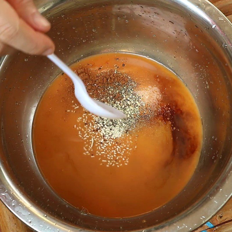 Step 2 Prepare the marinade for fried chicken with whole mac mat leaves