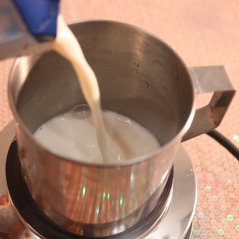 Step 1 Heat the milk for milo sponge cake