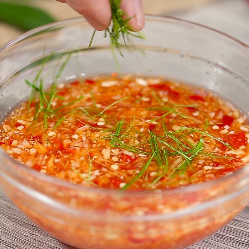 Step 3 Making the dipping sauce for steaming snails with ginger and lemongrass