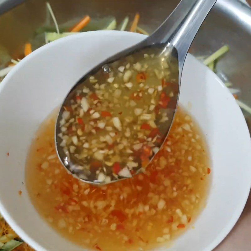 Step 1 Make the salad dressing for Dried Mango Salad with Chicken, Lime, and Chili