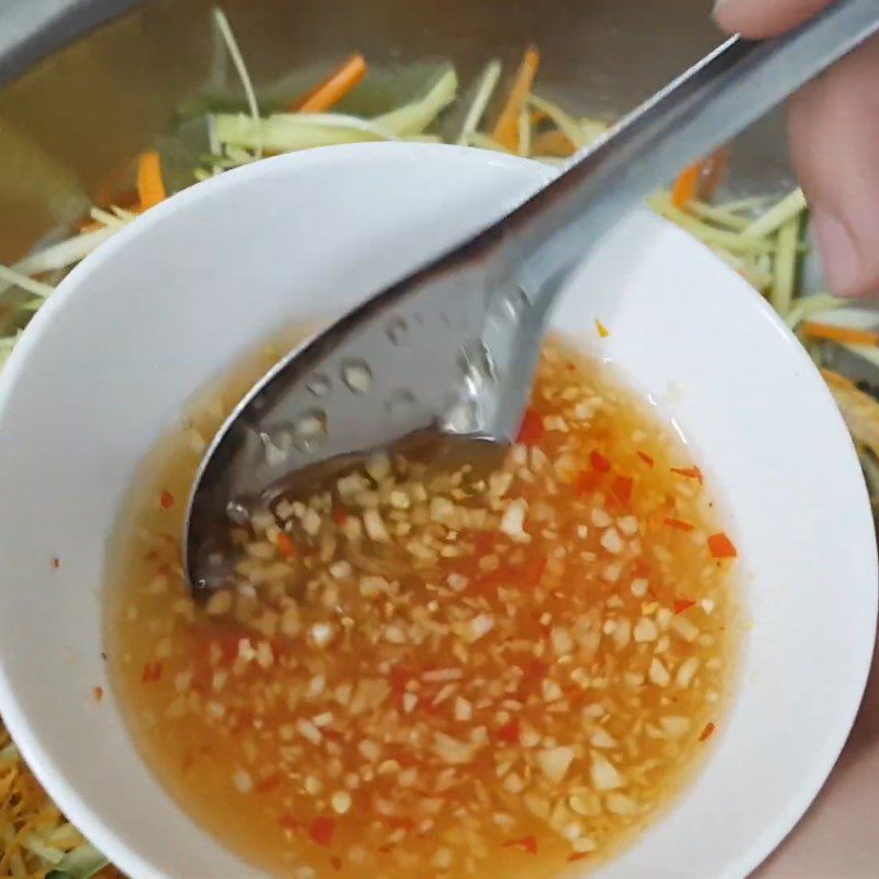 Step 1 Make the salad dressing for Dried Mango Salad with Chicken, Lime, and Chili