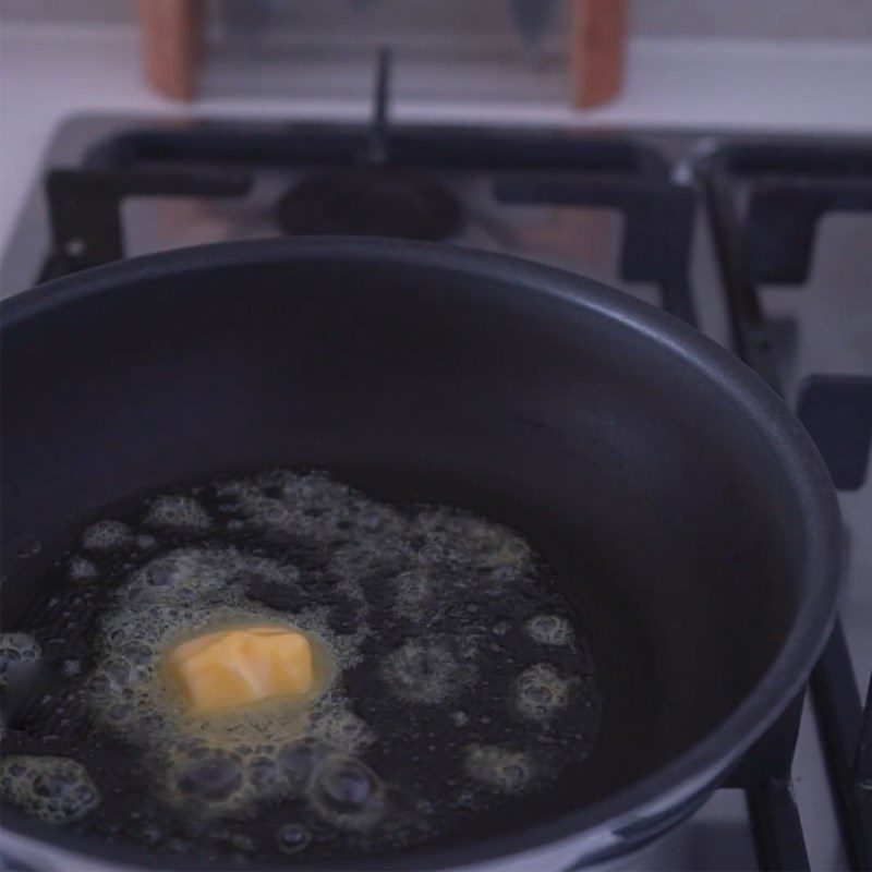 Step 2 Make butter sauce Flambé banana with orange liqueur