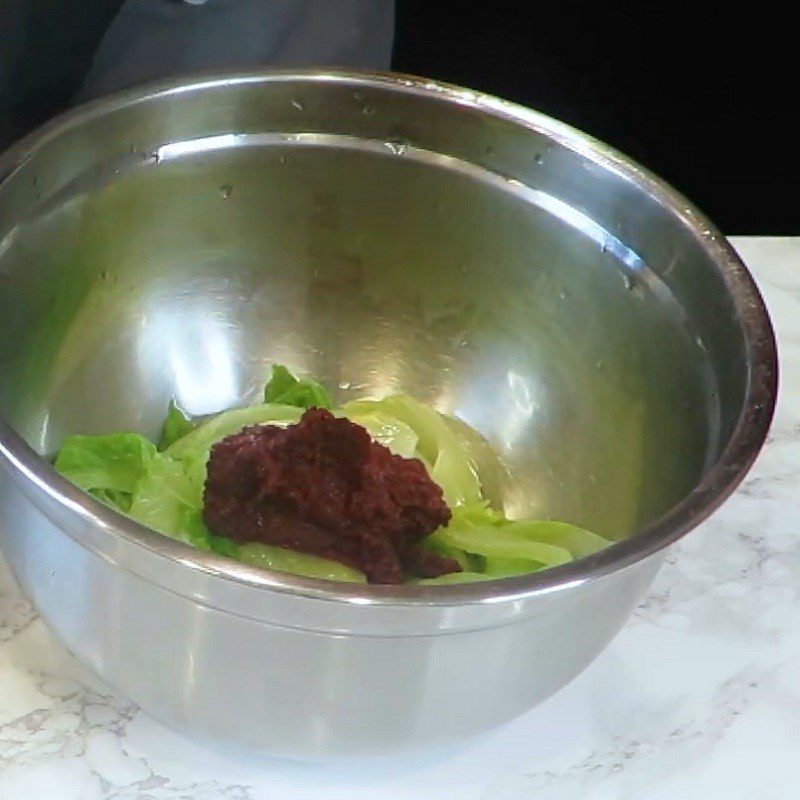 Step 4 Make spicy chili sauce and mix with cabbage Korean potato soup with bones