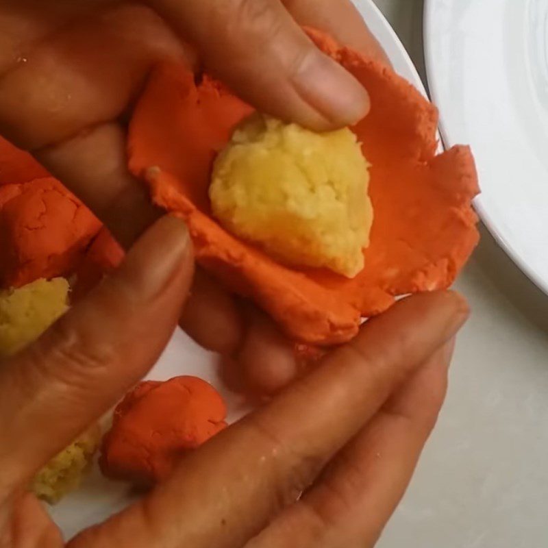 Step 5 Making floating cake with gac and mung bean filling