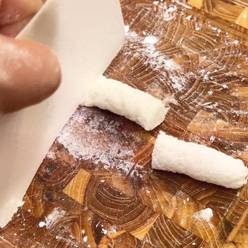 Step 2 Roll the dough and shape Tokbokki using leftover rice (Recipe shared from TikTok Cooking with TasteVN)
